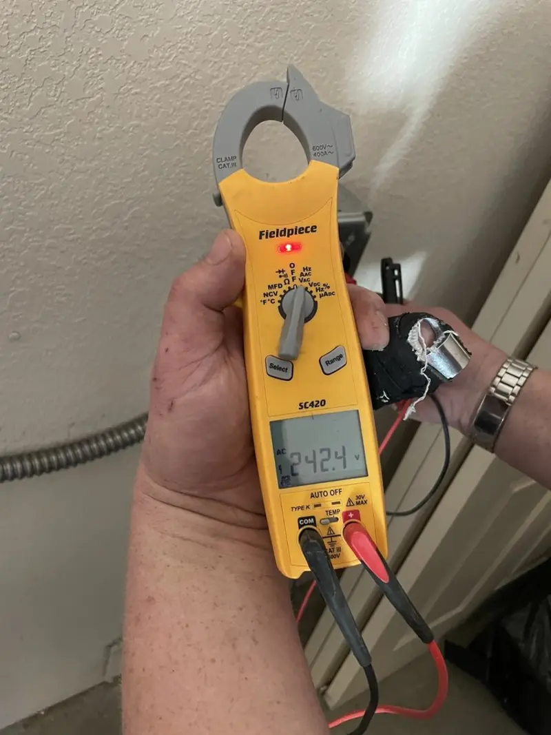 Voltage testing with clamp meter during Circuit Breaker Repair in Kannapolis